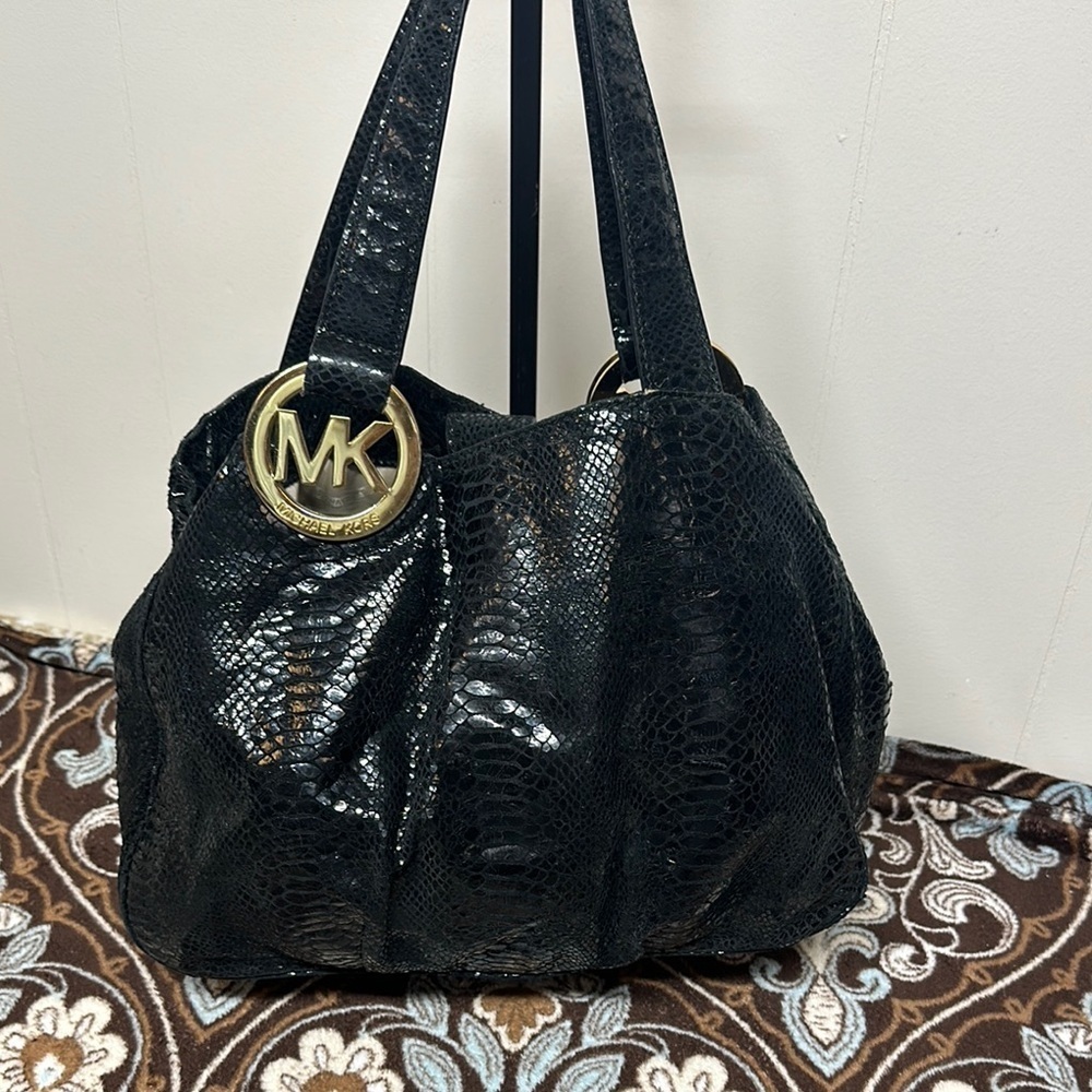 Michael Kors Black Hobo Bag With Gold Emblem